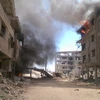 Khói bốc lên sau cuộc không kích ở thị trấn Daraya, khu vực bên ngoài thủ đô Damascus. (Nguồn: AFP/TTXVN)