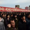 Người dân Triều Tiên tham gia tuần hành ủng hộ lãnh đạo Kim Jong Un tại quảng trường Kim Nhật Thành ngày 5/1. (Nguồn: AFP/TTXVN)