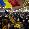 Người dân Romania biểu tình tại thủ đô Bucharest ngày 29/1. (Nguồn: AFP/TTXVN)