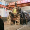 Nhà lãnh đạo Kim Jong-Un kiểm tra công tác chuẩn bị cho việc phóng tên lửa đất đối đất tầm trung Pukguksong-2 tại căn cứ không quân Banghyon thuộc tỉnh Bắc Pyongan ngày 11/2. (Nguồn: Yonhap/TTXVN)