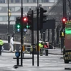 Nhân viên điều tra tại hiện trường vụ tấn công bên ngoài tòa nhà Quốc hội Anh ở London ngày 23/3. (Nguồn: AFP/TTXVN)
