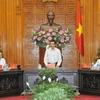 Phó Thủ tướng, Bộ trưởng Ngoại giao, Phạm Bình Minh, Chủ tịch Ủy ban Quốc gia APEC 2017, chủ trì Phiên họp toàn thể lần thứ 5 Ủy ban Quốc gia về APEC 2017. (Ảnh: Nguyễn Khang/TTXVN)