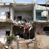 Một ngôi nhà bị phá hủy trong cuộc không kích ở Daraa, Syria, ngày 8/4. (Nguồn: AFP/TTXVN)