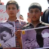 Trẻ em Syria biểu tình phản đối vụ tấn công nghi sử dụng vũ khí hóa học tại Khan Sheikhun. (Nguồn: AFP/TTXVN)