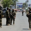 Binh sỹ Afghanistan triển khai tới hiện trường một vụ tấn công. (Nguồn: AFP/TTXVN)