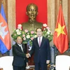 Chủ tịch nước Trần Đại Quang tiếp Chủ tịch Quốc hội Vương quốc Campuchia Samdech Heng Samrin đang thăm hữu nghị chính thức Việt Nam. (Ảnh: Nhan Sáng/TTXVN)