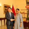 Phó Thủ tướng Vương Đình Huệ và Bộ trưởng Ngoại giao Indonesia Retno Marsudi. (Ảnh: Đỗ Quyên/Vietnam+)