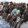 Người di cư. (Nguồn: AFP)