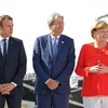 Thủ tướng Đức Angela Merkel (phải), Thủ tướng Italy Paolo Gentiloni (giữa) và Tổng thống Pháp Emmanuel Macron (trái) tại cuộc gặp ở Trieste, Italy ngày 12/7. (Nguồn: EPA/TTXVN)