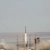 Tên lửa Simorgh rời bệ phóng tại Trung tâm vũ trụ quốc gia Imam Khomeini ở Iran ngày 27/7. (Nguồn: EPA/TTXVN)