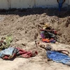 Một trong số những hố chôn tập thể được phát hiện tại Iraq. (Nguồn: AFP/TTXVN)