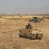 Binh sỹ Thổ Nhĩ Kỳ tuần tra tại khu vực cửa khẩu biên giới Habur giữa Thổ Nhĩ Kỳ và Iraq ngày 18/9. (Nguồn: AFP/TTXVN)