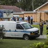 Cảnh sát điều tra tại hiện trường vụ xả súng ở nhà thờ Burnette Chapel ngày 24/9. (Nguồn: AFP/TTXVN)