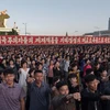 Người dân Triều Tiên tham gia lễ mít tinh ở Bình Nhưỡng ngày 23/9. (Nguồn: AFP/TTXVN)