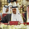 Quốc vương Qatar Tamim bin Hamad Al-Thani (giữa). (Nguồn: AFP/TTXVN) 