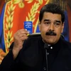 Tổng thống Nicolas Maduro (giữa) tại cuộc họp báo ở Caracas ngày 17/10. (Nguồn: AFP/TTXVN)