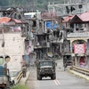 Binh sỹ Philippines tuần tra tại Marawi sau khi thành phố này được giải phóng ngày 19/10. (Nguồn: THX/TTXVN)