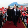 Tổng thống Mỹ Donald Trump và phu nhân tại lễ đón ở Sân bay Quốc tế Bắc Kinh. (Nguồn: THX/TTXVN)