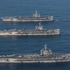 Tàu sân bay USS Ronald Reagan, Theodore Roosevelt và Nimitz của Mỹ tham gia cuộc tập trận chung Hàn-Mỹ trên vùng biển phía đông Hàn Quốc ngày 12/11. (Nguồn: Yonhap/TTXVN)