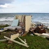 Nhà cửa bị phá hủy sau bão Maria tại Yabucoa, Puerto Rico ngày 28/9. (Nguồn: AFP/TTXVN)