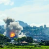 Khói bốc lên sau các cuộc không kích của Không quân Philippines nhằm vào các vị trí của phiến quân tại Marawi trên đảo Mindanao ngày 17/9. (Nguồn: AFP/TTXVN)