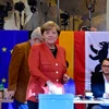 Thủ tướng Angela Merkel bỏ phiếu tại một địa điểm bầu cử ở Berlin ngày 24/9. (Nguồn: AFP/TTXVN)
