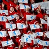 Đoàn cổ vũ Triều Tiên vẫy cờ thống nhất Triều Tiên tại lễ khai mạc Olympic PyeongChang 2018 ở Pyeongchang, Hàn Quốc ngày 9/2. (Nguồn: AFP/TTXVN)