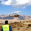 Lực lượng cứu hộ tìm kiếm mảnh vỡ máy bay ATR 72 tại vùng núi Dena, miền trung Iran ngày 19/2. (Nguồn: THX/TTXVN)