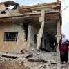 Căn nhà của người dân bị phá hủy do xung đột tại Đông Ghouta. (Nguồn: THX/TTXVN)