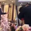 Bố chồng hôn con dâu ngay trên sân khấu trong tiệc cưới
