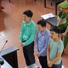 Các bị cáo tại phiên tòa vào sáng 23/5. (Ảnh: Thanh Hải/TTXVN)