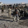 Lực lượng an ninh Afghanistan điều tra tại hiện trường một vụ tấn công. (Nguồn: AFP/TTXVN)