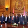 Đoàn đại biểu Việt Nam trong buổi làm việc với Phó Thủ tướng thứ nhất kiêm Bộ trưởng Tài chính Hungary. (Ảnh: Quang Vinh/Vietnam+)