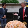 Thủ tướng Canada Justin Trudeau và Tổng thống Mỹ Donald Trump. (Nguồn: AFP/TTXVN)