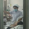 Bệnh nhân nhiễm cúm A/H1N1 nguy kịch đang được cách ly điều trị tại Bệnh viện Chợ Rẫy. (Ảnh: Đinh Hằng/TTXVN)