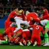 Các cầu thủ đội tuyển Anh ăn mừng chiến thắng vượt qua Colombia sau loạt đá penalty căng thẳng với tỷ số 4-3 và lọt vào vòng tứ kết Giải bóng đá World Cup 2018 trong trận đấu loại trực tiếp diễn ra ở Moskva, Nga, ngày 3/7. (Nguồn: AFP/TTXVN)