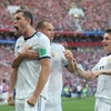 Tiền đạo Artem Dzyuba (ảnh, trái) ăn mừng bàn thắng từ chấm phạt đền san bằng tỷ số 1-1 cho tuyển Nga trong trận gặp Tây Ban Nha vòng 1/8 World Cup 2018 diễn ra trên sân Luzhniki ở Moskva ngày 1/7. (Nguồn: THX/TTXVN) 