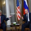 Tổng thống Nga Vladimir Putin (phải) và Tổng thống Mỹ Donald Trump trong cuộc gặp thượng đỉnh ở Helsinki (Phần Lan) ngày 16/7. (Nguồn: AFP/TTXVN)