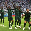 Niềm vui của các cầu thủ Nigeria sau khi ghi bàn vào lưới đối thủ. (Nguồn: THX/TTXVN)