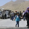 Người tị nạn Syria chuẩn bị hồi hương từ Liban ngày 28/6. (Nguồn: AFP/TTXVN)