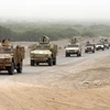 Các lực lượng ủng hộ Chính phủ Yemen làm nhiệm vụ tại khu vực al-Durayhimi, Hodeidah ngày 13/6. (Nguồn: AFP/TTXVN)