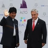 Tổng thống Bolivia Evo Morales (trái) và người đồng cấp Chile Sebastian Pinera tại cuộc gặp ở Santiago, Chile ngày 26/1/2013. (Nguồn: AFP/TTXVN)