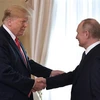 Tổng thống Mỹ Donald Trump (thứ 2, trái) và người đồng cấp Nga Vladimir Putin (phải) trong cuộc gặp thượng đỉnh tại Helsinki, Phần Lan ngày 16/7/2018. (Nguồn: AFP/TTXVN) 