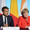 Tổng thống Pháp Emmanuel Macron và Thủ tướng Đức Angela Merkel. (Nguồn: time.com) 