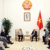 Thủ tướng Nguyễn Xuân Phúc tiếp ông Greg Norma, Đại sứ du lịch Việt Nam nhiệm kỳ 2018-2021. (Ảnh: Thống Nhất/TTXVN) 