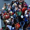 Người di cư Honduras bắt xe tải ở Mapastepec tới bang Pijijiapan Chiapas, Mexico, chờ cơ hội sang Mỹ ngày 25/10/2018. (Nguồn: AFP/TTXVN) 