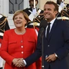 Tổng thống Pháp Emmanuel Macron (phải) và Thủ tướng Đức Angela Merkel (trái) trong cuộc gặp tại Marseille, Pháp, ngày 7/9. (Nguồn: AFP/TTXVN) 
