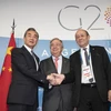 Ngoại trưởng Trung Quốc Vương Nghị (trái), Ngoại trưởng Pháp Jean-Yves Le Drian (phải) và Tổng Thư ký Liên hợp quốc LHQ Antonio Guterres (giữa) trong cuộc găp bên lề Hội nghị G20 tại Buenos Aires (Argentina). (Nguồn: THX/TTXVN) 