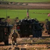 Đoàn xe quân sự Mỹ tới làng Yalanli, ngoại ô phía tây của thành phố miền Bắc Syria Manbij trong chiến dịch chống IS, ngày 5/3/2017. (Nguồn: AFP/TTXVN) 
