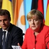 Tổng thống Pháp Emmanuel Macron (trái) và Thủ tướng Đức Angela Merkel. (Nguồn: kyivpost.com) 